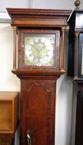 A 19th Century stained oak longcase clock with dial marked for Adam Kosten, Kirkham and thirty