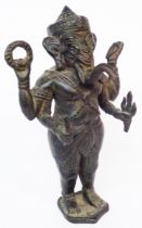 An antique bronze statue, depicting the Hindu god Ganesh