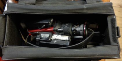 A JVC Videomovie camera in a Camlink case containing wires and accessories