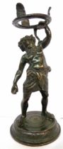 A small bronze figural stand, depicting a man holding aloft a snake