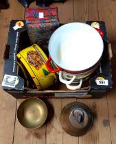 A box containing a quantity of collectable items including vintage tins, brass porch bell, etc.