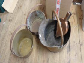 Two brass preserving pans with wrought iron handles - sold with a brass coal scuttle of helmet