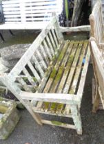 A 1.22m teak two seater garden bench with slatted back and seat