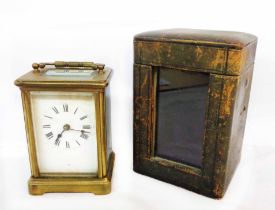 A brass and bevelled glass cased carriage timepiece with French eight day movement and original