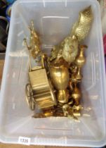 A crate containing a large quantity of brassware including large owl figurine, chased vases, etc.