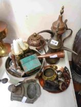 A quantity of assorted metalware including Turkish copper and brass coffee pots, brass candlesticks,