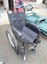 A Lomax folding wheelchair