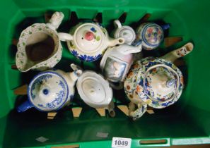 A crate containing a quantity of ceramic teapots including Royal Doulton Norfolk pattern, etc.