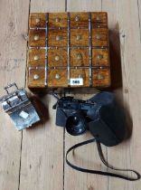 A wooden lift-top box with metal decoration - sold with a Yashica Electro 35 camera and a silver