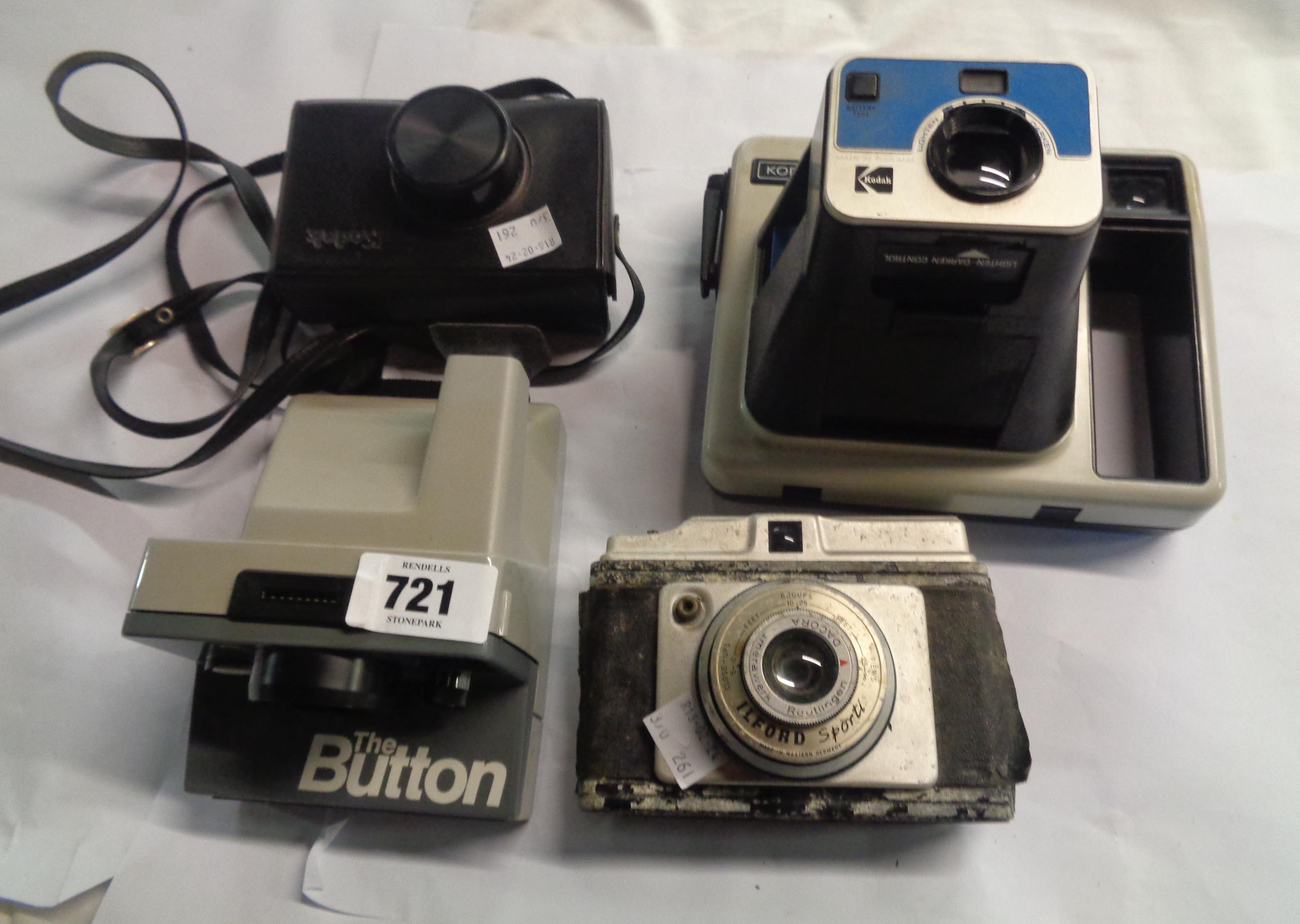 A Kodak Instamatic 233 Camera in original case, a Polaroid Land Camera 'The Button', another