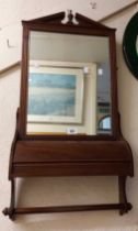 An Edwardian mahogany bathroom wall mirror with oblong plate, curved lift-top compartment and