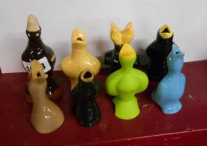 Seven pottery pie funnels of bird form - sold with a silicon example