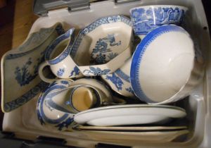 A crate containing a quantity of blue and white china including Wedgwood, George Jones, etc.