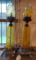 A pair of vintage table lamps of torchere form with textured glass body and cast brass fittings