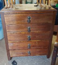 A 59cm early 20th Century walnut sheet music chest with flight of five drawers, each with fall-