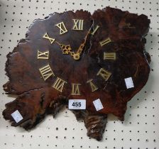 A modern varnished natural wood wall timepiece marked 'Perth, Western Australia' with battery