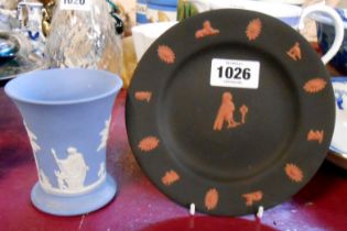 A Wedgwood black basalt plate with terracotta Jasperware Egyptian style decoration - sold with