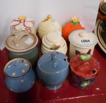 Nine preserve pots of various form including Carlton Ware, Shorter, etc.