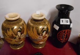 A pair of Japanese late Satsuma vases with figural gilt and moriage decoration - sold with a