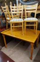 A 1.2m modern mixed wood kitchen table, set on turned legs - sold with a set of four kitchen chairs