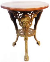 A 59.5cm diameter late Victorian public house table with walnut top and original gilt paint to the