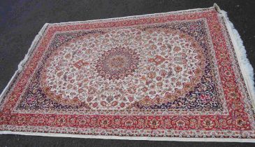 A modern machine made Persian pattern rug with wide border and cream ground - 2.2m X 1.6m