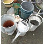 Two galvanised watering cans - sold with a small galvanised bath, a quantity of buckets, etc.