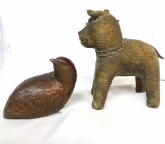 An old African bronze figurine, depicting a stylised dog - sold with a spelter partridge