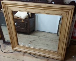 An old waxed pine framed oblong wall mirror - 100cm X 90cm