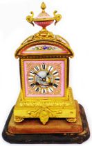 A 19th Century French ornate ormolu salon clock with inset Sevres style hand painted porcelain