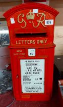 An original vintage George VI cast iron letter box with red and gold painted finish, enamel front