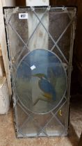 A leaded glass window with central oval panel, depicting a kingfisher