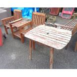 A 1.6m slatted teak two seater garden couples bench - sold with a similar table