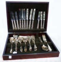 A vintage canteen containing a part set of silver plated 'Dubarry' pattern and other cutlery