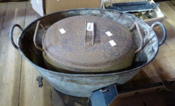 An old Kenrick & Son No2. four gallon saucepan of oval form with original tin lid - sold with a