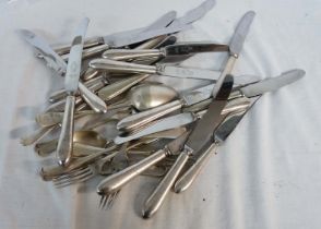 A bag containing a quantity of assorted silver plated cutlery
