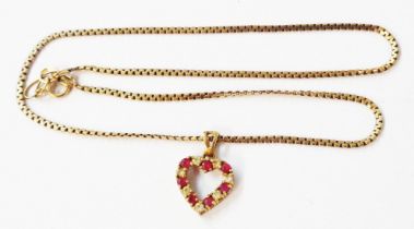 A small 9ct. gold heart shaped open pendant, set with white paste and tiny rubies, on 9ct. gold neck