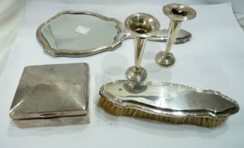 A damaged silver cigarette box and pair of bud vases - sold with a silver mounted hand mirror and