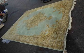 A modern Louis de Poortere machine made carpet with central floral motif within a decorative