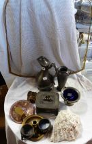 A collection of pewter and brass items including a pewter jug, lidded container, etc. - sold with