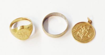 A 375 (9ct.) gold wedding band - sold with a 9ct. gold signet ring and a 9ct. St. Christopher (