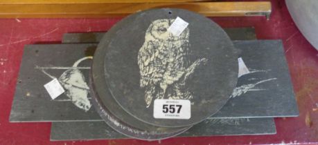 A quantity of slate plaques with various white painted decoration