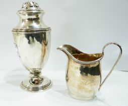 An early 20th Century Birmingham silver cream jug (dents) - sold with a damaged silver sugar caster