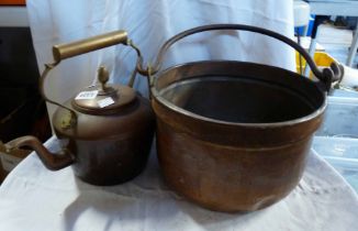 A copper kettle with brass handle - sold with a copper bucket