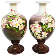 A pair of 19th Century Doulton Faience vases of baluster form, with hand painted dog rose decoration