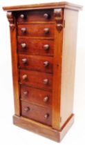 A 52cm Victorian mahogany Wellington chest with flanking capitals and flight of seven bracket