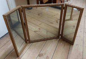 A vintage gilt framed triple dressing table mirror