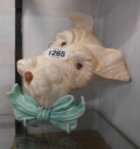 An Art Deco Beswick pottery wall mask in the form of a terrier wearing a bow tie - Model No. 301