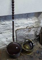 A quantity of metalware including copper and brass coal buckets, fire guard, warming pan, etc.