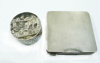 An 800 grade compact case with engine turned decoration (catch lip missing) - sold with a